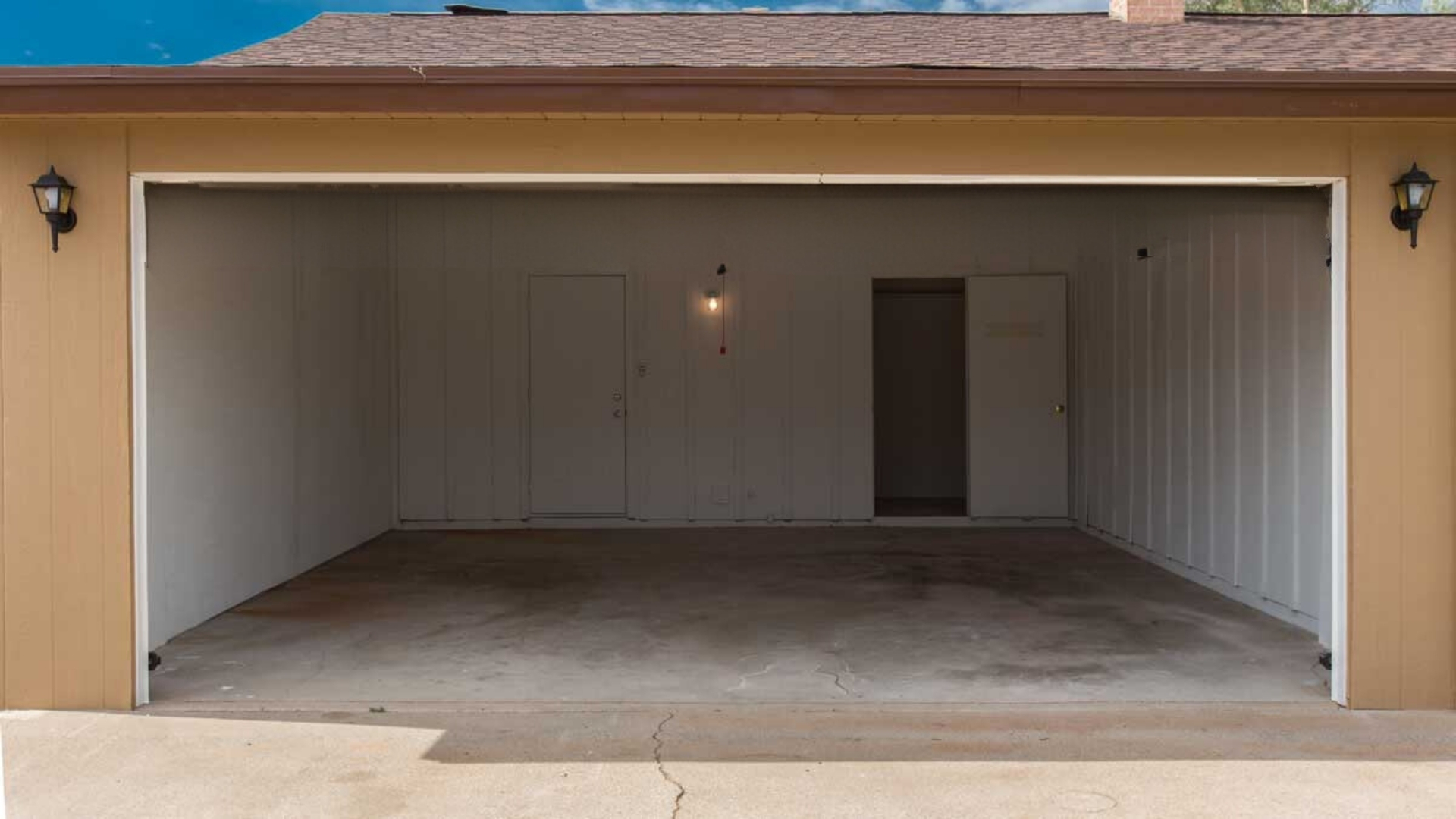 A garage that is cleaned and prepped for a new door installation