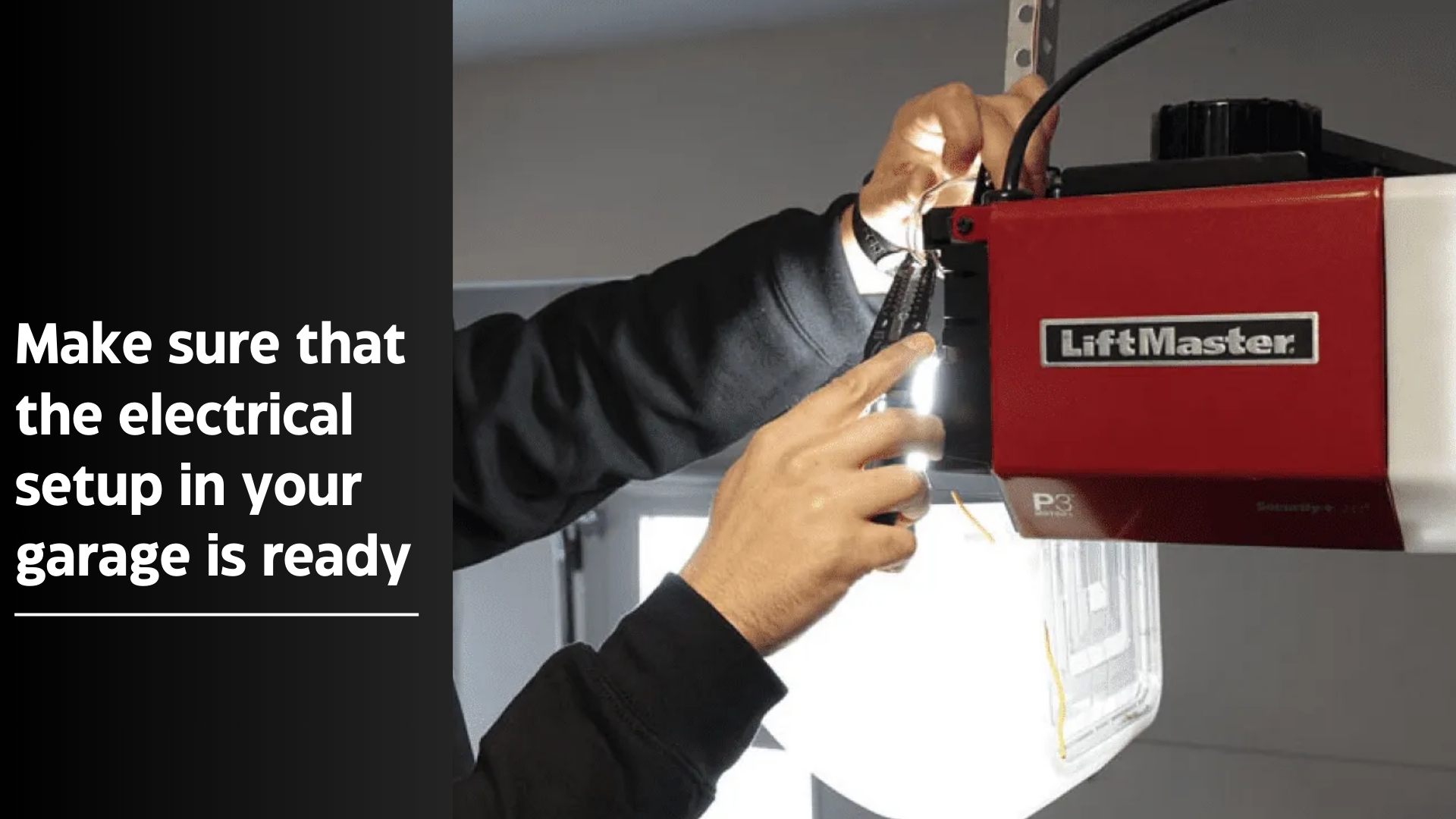 A garage door technician making sure that the electrical setup for the garage door opener is ready