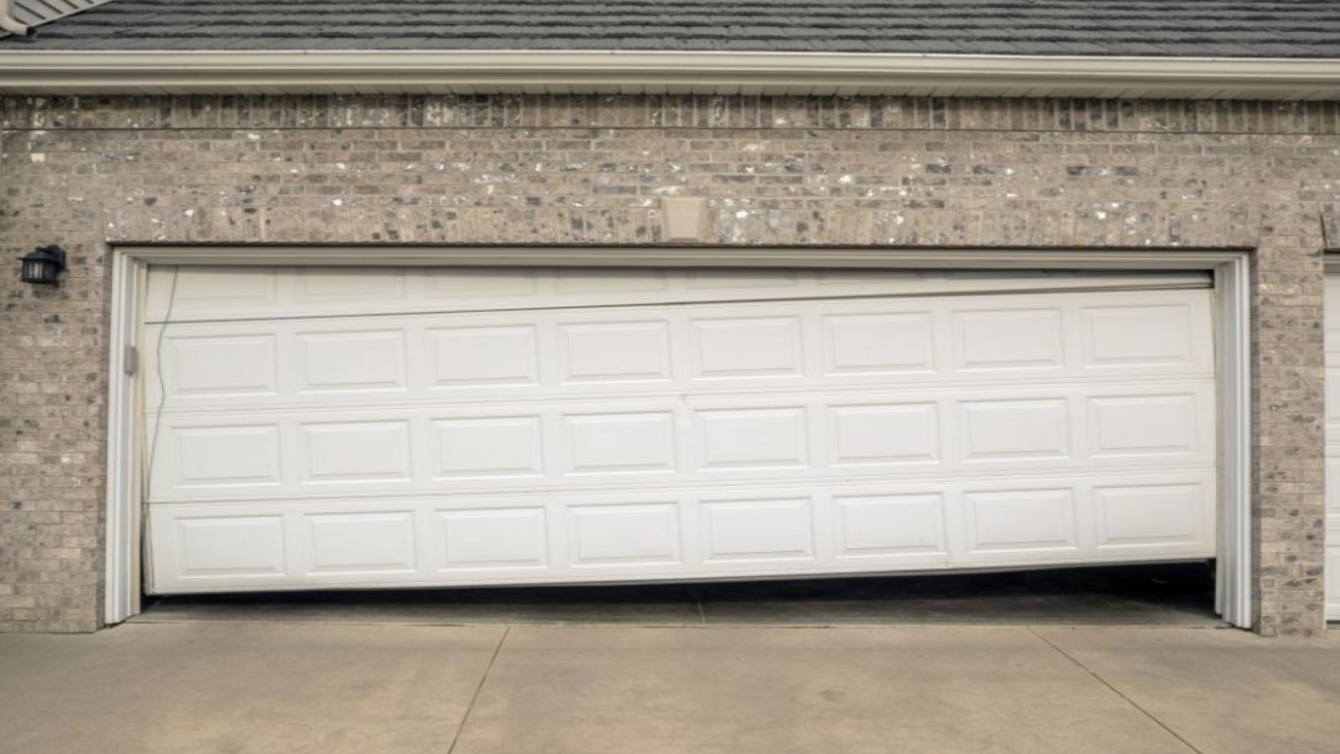 A home with a misaligned garage door