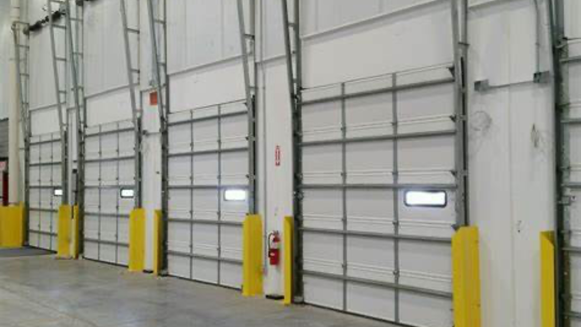 Loading dock doors with cross-bracing meets wind code ratings.