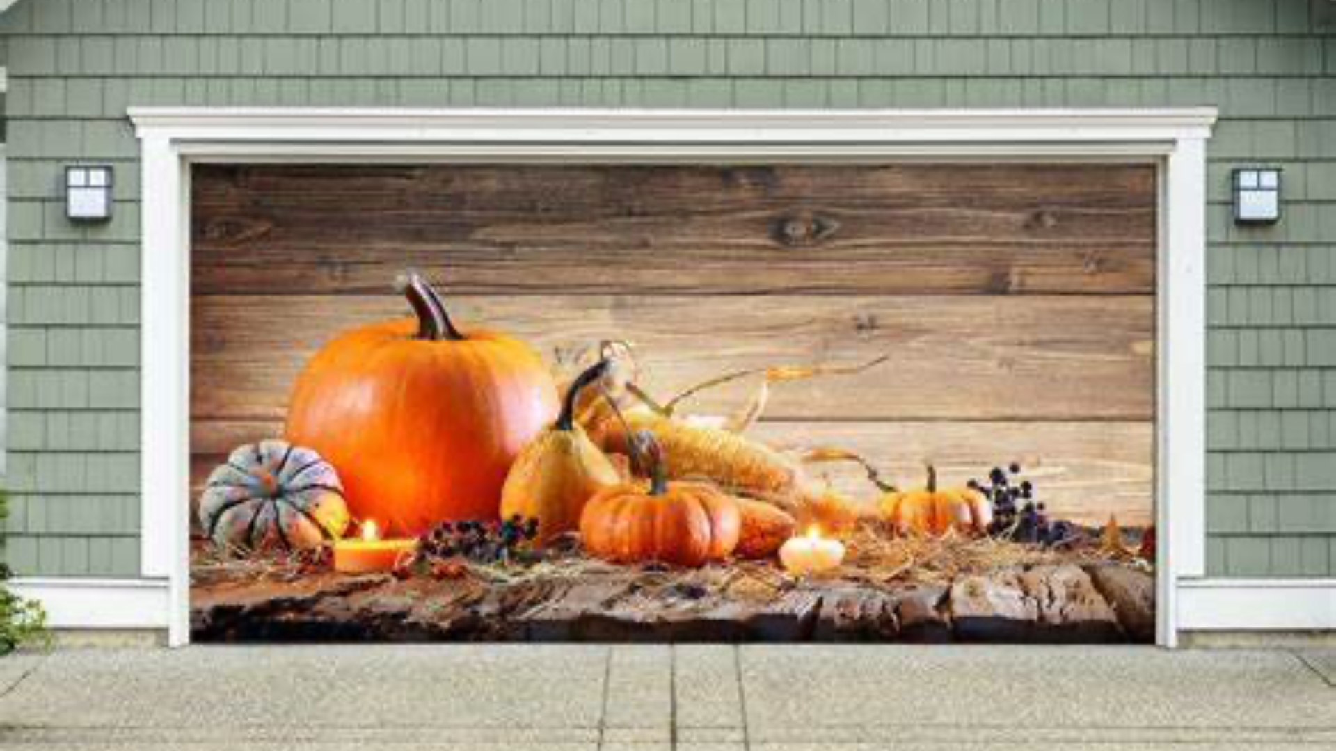 A decorated garage door showcases a rustic fall scene.