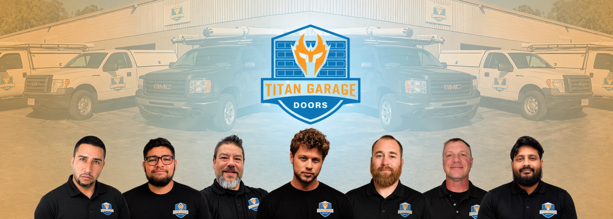 Team of professional garage door technicians from Titan Garage Doors Des Moines standing in front of branded service trucks and warehouse building.